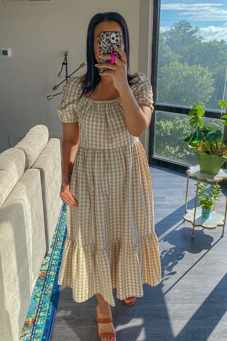 Give me all the work appropriate dresses! This gingham midi dress has puff sleeves that can be worn on or slightly off the shoulder plus the dress has pockets. I’m wearing the dress in size 4. // gingham dress, work dress, wear to work, summer family pictures dress, lightweight summer dress #LTKworkwear #LTKsalealert #LTKunder100 Family Pictures Dress, Playful Gingham Dress With Short Sleeves, Knee-length Gingham Midi Dress For Summer, Appropriate Dresses, Spring Playful Gingham Dress, H&m Gingham Dress, Gingham Midi Dress, Chic Gingham Midi-length Maxi Dress, Summer Family Pictures