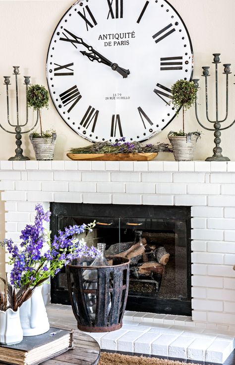 Oversized clock above a fireplace mantel Mantels Ideas Fireplace, Decorating A Mantel, Girly House, Fire Ideas, Rustic Mantle, Above Fireplace, Styling Bookshelves, Oversized Clocks, Mantel Decorating