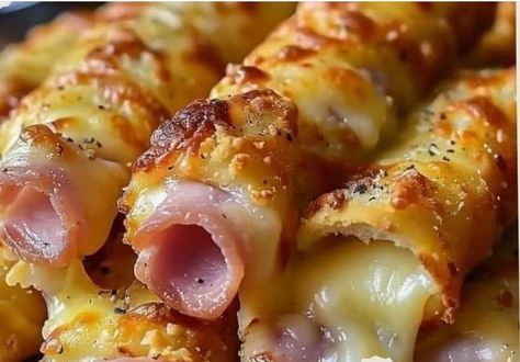 Ham and Cheese Sticks Baked Ham And Cheese Sticks, Ham And Cheese Sticks Crescent Rolls, Ham And Cheese Sticks, Ham And Cheese Rollups, Cheddar Cheese Sticks, Ham And Cheese Crescent Rolls, Ham Delights, Easy Puff Pastry Desserts, Spring Cooking