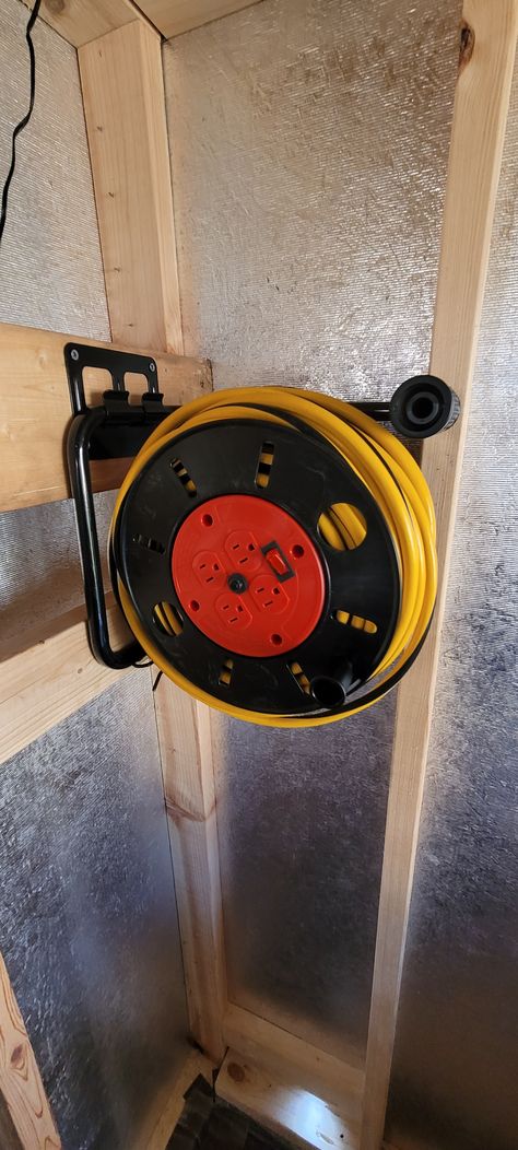 Running power to my shed with a 100ft 12/3 yellow jacket extension cord and cord reel. (bought separately) bought extension cord from Sam's club and the reel from Amazon. Extension Cord Storage Diy, Extension Cord Storage, Extension Cord Reel, Woodwork Workshop, Workshop Shed, Cord Storage, Hand Crank, Sam's Club, Yellow Jacket