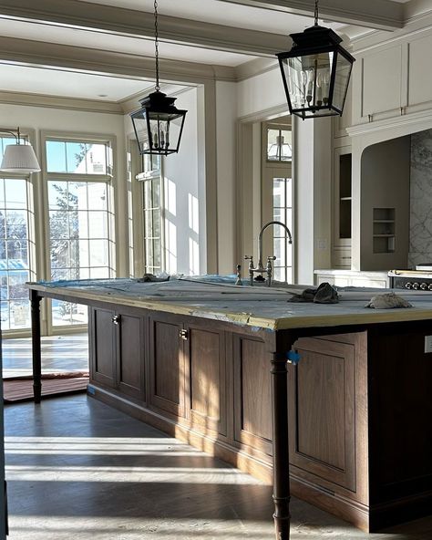 Steve Tiek | Tiek Design Group on Instagram: “Morning sun spilling into our #NewEnglandTudor ☀️. We were strategic about capturing morning sun through the entire main floor living…” Grace Stoffer Design, Kitchen Islands With Leg Supports, Steve Tiek Design, Off Center Sink In Island, Kitchen Behind Living Room, Range In Kitchen Island, Steve Tiek, 1800s Kitchen, Lower Level Bar