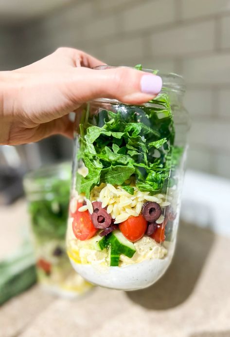 Vegan Greek Salad with Orzo is a delightful blend of Mediterranean flavors, perfect for a light and nutritious meal. This recipe offers a creative twist by incorporating orzo pasta and tofu feta into the classic Greek salad, making it a filling and satisfying dish that's also convenient for meal prep. Jump to FAQ Ingredients & Salad With Orzo, Vegan Greek Salad, Jar Meal Prep, Classic Greek Salad, Mason Jar Meal Prep, Salad Making, Tofu Feta, Mediterranean Flavors, Vegan Greek