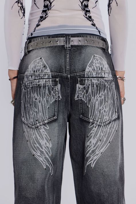 Black Ethereal Colossus Jeans Original low rise Colossus fit Heavy weight non-stretch denim x5 pocket styling Inside knee darts Heavy acid wash Wing screen print on back Stud detail to back print Model is 6 ft 1 and wears a size W32Style code: JMJE419485% Cotton, 10% Viscose, 5% PolyesterHand wash separatelyWash inside outLay flat to dryAvoid contact with light colours and upholstery as colour may transfer Gruge Jeans, Back Pocket Designs Jeans Painting, Black Painted Jeans, Words On Jeans, Jeans Pocket Painting, Bleach Jeans Design, Bleach Painted Jeans, Bleached Trousers, Black Bleached Jeans