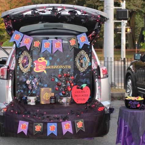 When it comes to trunk-or-treating, I'll admit it, my car is the LAME-O-trunk. I typically fling a bag of assorted candy (if I'm lucky) into the back of my car Decendants Trunk Or Treat, Descendants Trunk Or Treat Ideas For Cars, Disney Descendants Trunk Or Treat, Villain Trunk Or Treat, Descendants Trunk Or Treat Ideas, Sleeping Beauty Trunk Or Treat, Descendants Trunk Or Treat, Trunk Or Treat Ideas Disney, Cinderella Trunk Or Treat