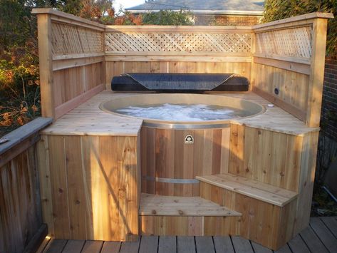 Our Cedar Hot Tubs are the ultimate in relaxation matched with the elegance of Canadian handcrafted cedar. We can also customize many things... just ask! Backyard Getaway Ideas, Hot Tub Surround Ideas, Diy Hot Tubs, Tub Surround Ideas, Round Hot Tub, Hot Tub Landscaping, Hot Tub Surround, Hot Tub Designs, Hot Tub Room