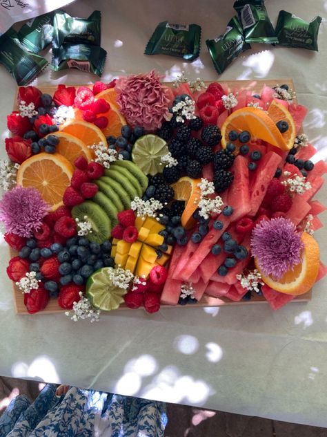 Fruit Platter With Flowers, Garden Party Fruit Display, Garden Theme Charcuterie Board, Fruit Decoration Ideas For Party, Wildflower Party Food Ideas, Flower 21st Birthday Party Ideas, Fruit Salad Party Ideas, Charcuterie Board Garden Party, Flower Fruit Platter