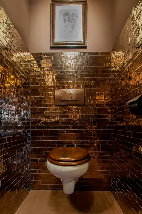 Gold Downstairs Toilet, Golden Bathroom Ideas, Moroccan Style Bathroom, Tile Toilet, Understairs Toilet, Victorian Hotel, Public Restroom Design, Golden Bathroom, Ladies Restroom