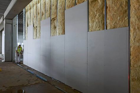 How To Build A Stud Wall Diy, How To Make Soundproof Room, Room Soundproofing, Building A Stud Wall On Concrete, Soundproofing Diy, Adding Insulation To Existing Walls, Building A Stud Wall, Container Insulation, Suspended Floor