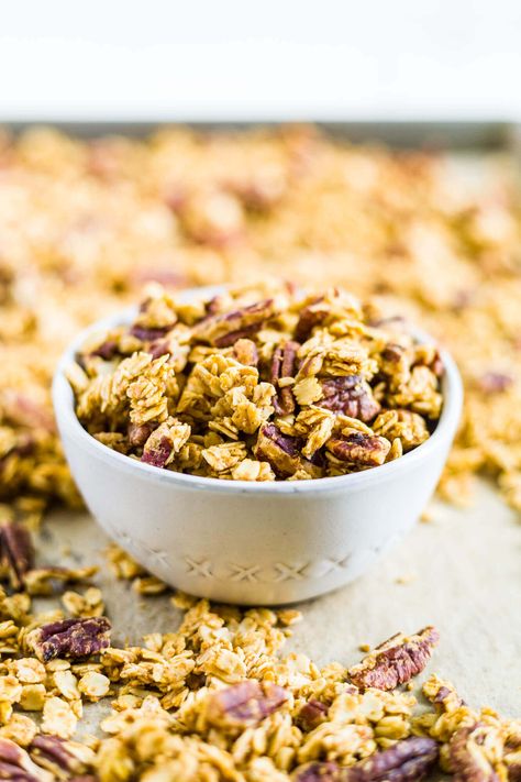 This healthy pumpkin spice granola is sweet, crunchy, and nutty, exploding with fall flavors! It's a gluten free and vegan granola recipe with lots of fall spices. It's great to top smoothies, eat as a snack or enjoy with milk. Vegan Granola Recipe, Maple Pecan Granola, Pumpkin Spice Granola, Vegan Granola, Pumpkin Spice Syrup, Maple Pecan, Granola Recipe, Fall Flavors, Healthy Pumpkin