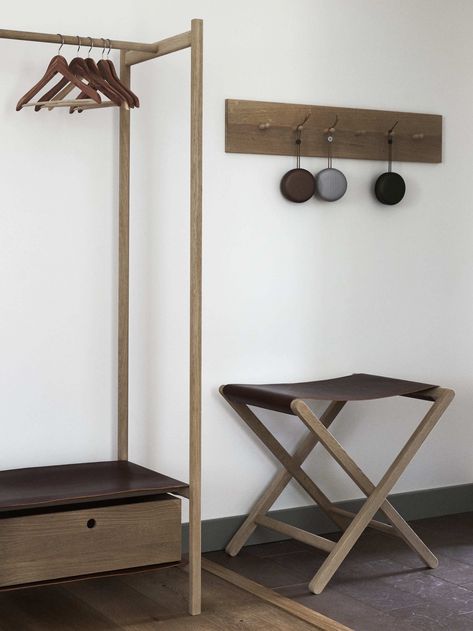 Halleröd designed a custom oak peg rail, standing clothes rack, and folding luggage rack for guest room entryways. Standing Clothes Rack, Open Closet, Hotel Room Design, Clothes Stand, Hotel Interiors, Hotel Furniture, Bedroom Hotel, Hotel Design, Hotels Design