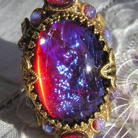 I absolutely love my birthstone especially fire opal, dragons breath opal, Ethiopian opal, and the regular opal.this one is the dragons breath opal Dragon Fire Opal, Dragons Breath Fire Opal, Dragons Breath Opal, Interesting Objects, Eye Gems, Exotic Jewelry, Mystical Jewelry, Dragons Breath, Cool Rocks