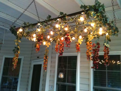 The porch chandelier I made for our deck out of a crib box spring Crib Repurpose, Crib Spring, Old Bed Springs, Bed Spring Crafts, Old Cribs, Diy Outdoor Lighting, Old Beds, Kids Dressers, Bed Springs