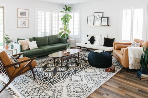 Black and white boho layered rugs mixed with brown leather chairs and a green sofa to create a tranquil relaxed and functional family room Green Sofa Living, Green Couch Living Room, Green Sofa Living Room, Green Couch, Green Sofa, Living Room Green, Living Room Decor Apartment, Boho Living Room, Living Room Inspo