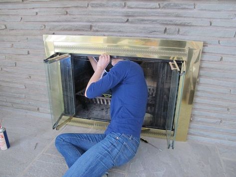 Removing the gold fireplace cover. Gold Fireplace Makeover, Removing Fireplace, Fireplace Covers, Fireplace Updates, Gold Fireplace, Propane Fireplace, Fake Fireplace, Clean Metal, Fireplace Update