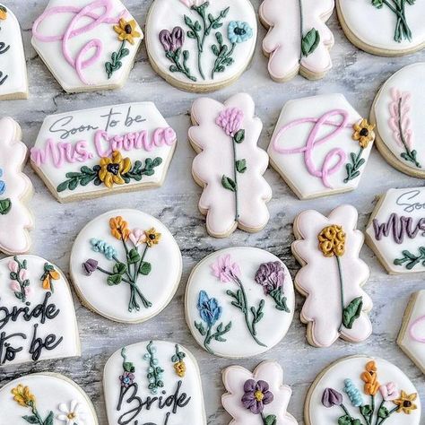 Wildflower Bridal Shower Balloons, Wildflower Bridal Shower Theme Cookies, Floral Wedding Shower Cookies, Bridal Shower Love Is In Bloom Theme, Floral Bridal Cookies, Bridal Shower Flower Cookies, Love Is Blooming Bridal Shower Theme Food, Spring Bridal Shower Cookies, Wildflower Bridal Cookies