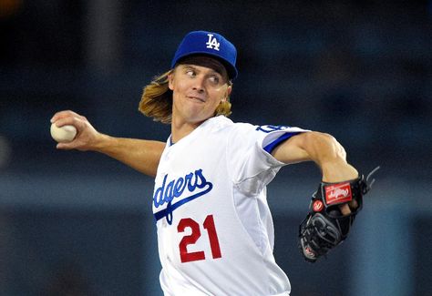 Former Los Angeles Dodgers starting pitcher Zack Greinke throws to the plate during the first inning of a baseball game against the Pittsburgh Pirates in Los Angeles. Position Reference, Super Bowl Tickets, Sports Article, Baseball Pitcher, Bobby Brown Stranger Things, Ny Mets, Sports Figures, Half Time, Human Poses Reference