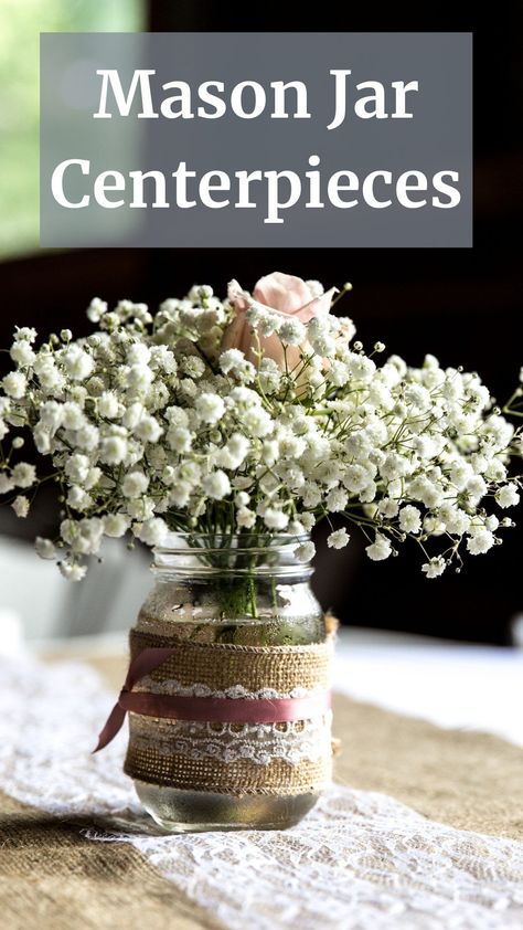 These easy and inexpensive Mason jar centerpieces are a lovely way to decorate your home, garden or wedding table. Get full tutorial and tips on our site! #masonjarcenterpieces #weddingcenterpieces #diymasonjarcarfts #masonjarcarfts #diyweddingdecor #weddingdecorideas