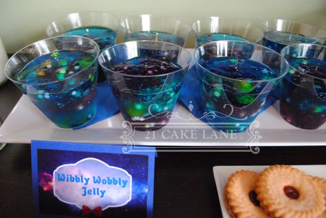 Doctor who bowling party Wibbly Wobbly Galaxy Jelly the glitter didn't show up in the photo very well :/  Instructions are here http://bakingdom.com/2012/08/doctor-who-wibbly-wobbly-timey-wimey-jello-in-a-jar.html Galaxy Jello, Doctor Who Party, 21st Cake, Party Styling, Aesthetic Galaxy, Bowling Party, Space Party, Timey Wimey Stuff, 4th Birthday Parties