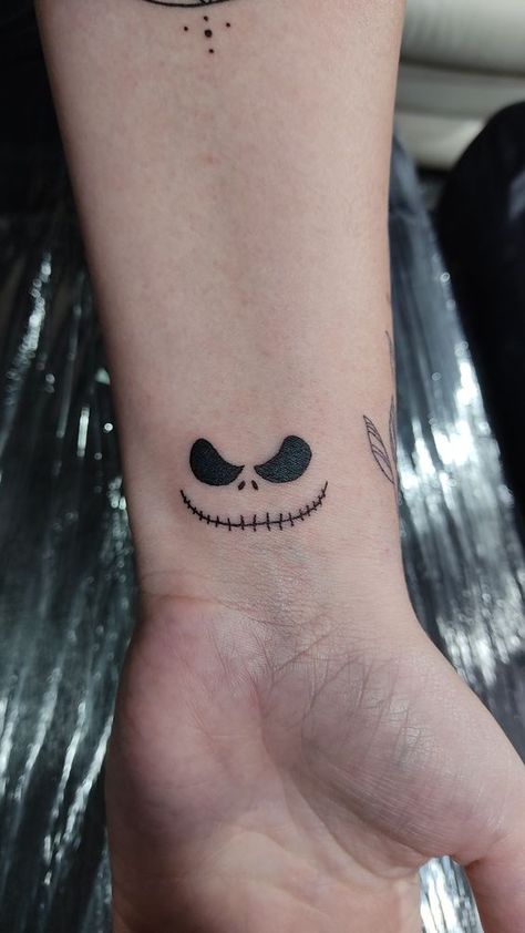 Jack Skellington Face Tattoo, Jake Skellington Tattoo, Small Jack Skellington Tattoo, Small Linework Tattoo Design, Zero Dog Tattoo, Jack Skellington Tattoo Ideas, Jack The Skeleton Tattoos, Nbc Tattoo, Small Nightmare Before Christmas Tattoo