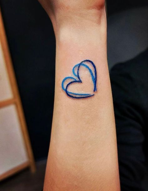 Tiny Blue Heart Tattoo, Blue Heart Tattoos For Women, Blue Heart Tattoo Ideas, Blue Outline Tattoo, Blue Line Tattoo For Women, Blue Tattoos For Women, Blue Heart Tattoo, Heart Tattoo On Face, Blue Ribbon Tattoo