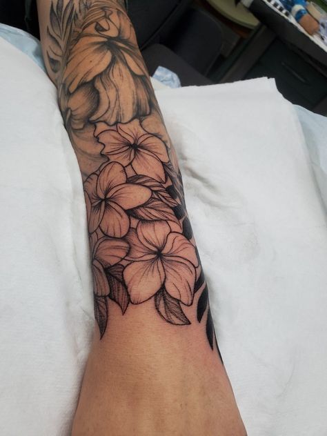 Hawaiian Flower Arm Tattoos For Women, Tropical Flower Forearm Tattoo, Small Word Cover Up Tattoo, Plumeria Sleeve Tattoo, Hibiscus Flower Forearm Tattoo, Plumeria Arm Tattoo, Plumeria And Hibiscus Tattoo, Plumeria Flowers Tattoo, Tropical Arm Sleeve Tattoo