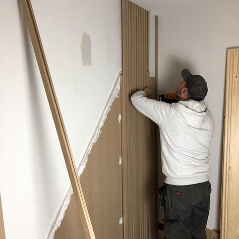 DIY PANELLED WALL WITH HIDDEN STORAGE — luke arthur wells Wall With Hidden Storage, Slat Wall Storage, Door Under Stairs, Hidden Doors In Walls, Space Under The Stairs, Timber Battens, Wall Cupboard, Wall Paneling Diy, Under Stairs Cupboard