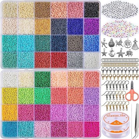 Includes 35000pcs 2mm 12/0 glass seed beads; 260pcs letter beads(130 black white beads+130 colorful beads); 9pcs silver color pendants; 1pcs beading needles; (50pcs jump ring, 20pcs lobster clasp, 20pcs ear hook) half gold and half silver; 1pcs small scissors; 1pcs tweezers;2 rolls of elastic string. This kit is suitable for all kinds of jewellrry making, Letter Bead Bracelets, Small Scissors, Jewelry Making Kit, Bracelet Kits, Loom Bands, Beading Needles, Bead Kits, Letter Beads, Seed Bead Necklace