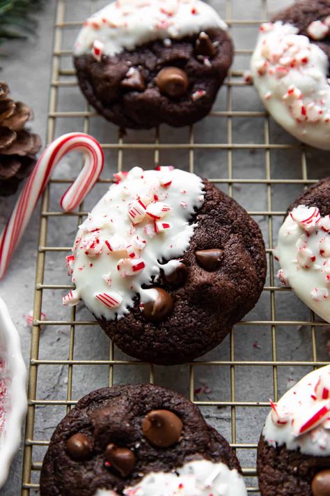 These chocolate candy cane cookies are full of chocolate and peppermint flavor! Each chocolate cookie is dipped in white chocolate and sprinkled with crushed peppermint candy canes. Chocolate Candy Cane Cookies, Peppermint Mocha Cookies, Peppermint Dessert, Crushed Peppermint, Gluten Free Christmas Cookies, Mocha Cookies, Chocolate Peppermint Cookies, Peppermint Candies, Candy Cane Cookies