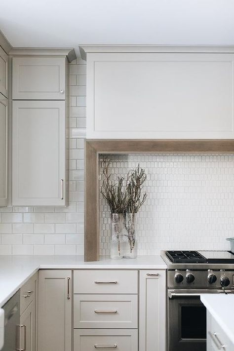 Rambler House, Marble Herringbone Tile, Wood Hood, Wooden Range Hood, Light Grey Kitchen Cabinets, Kitchen Cooktop, Backsplash Tile Design, Light Grey Kitchens, Transitional Kitchen Design