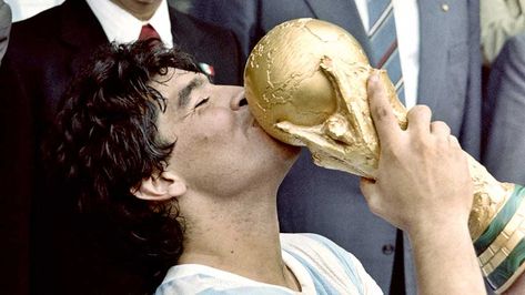 Argentina's Diego Maradona embraces the World Cup following his side's 3-2 victory over Germany in the 1986 World Cup final in Mexico. Mexico 86, World Cup Trophy, Football Cups, Soccer World, National Football Teams, World Cup 2014, Third World, Fifa World Cup, Lionel Messi