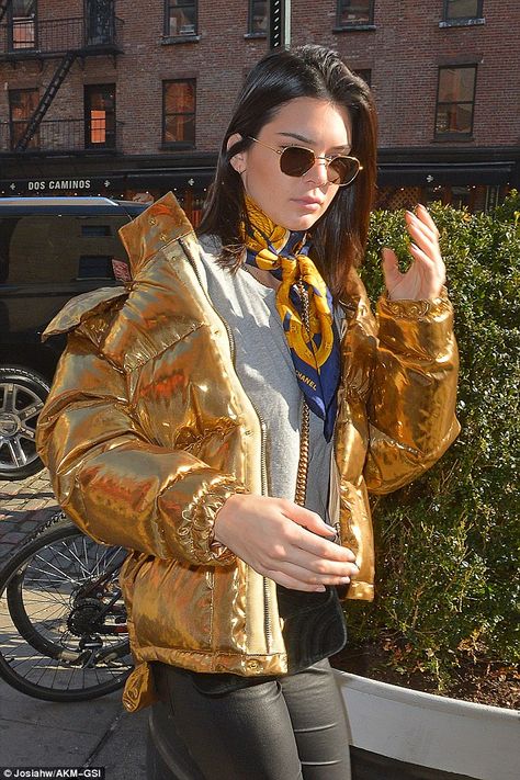 Glam: The model covered her eyes with gold-rimmed sunglasses and left her brunette tresses to hang loose in a centre parting Gold Puffer Jacket, Scarf Styling, Kendall Jenner Instagram, Ports 1961, Shiny Jacket, Metallic Jacket, Jenner Sisters, Gold Jacket, Puffy Coat