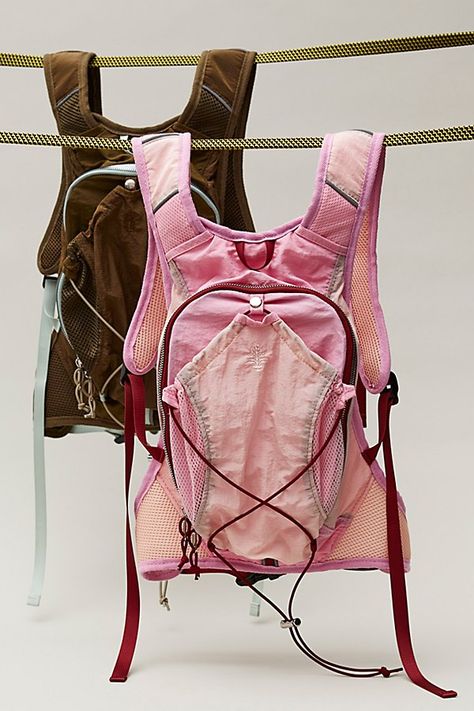 The perfect pick to take you from the trail to the track, this fashionable and functional backpack is featured in a smaller, body-contouring silhouette with padded piecing, drawstring detailing, and mesh fabrication for added breathability. **Features:** Small style, zip closure, drawstring detail, adjustable shoulder straps, padding for comfort, mesh piecing for breathability **Why We ❤ It:** Just as effortless as it is essential, this fun and functional backpack is *the* ideal piece to add to Fall Backpack, Drawstring Handbag, Functional Backpack, Backpack Free, Running Vest, Fancy Nancy, Bag Details, Outdoor Bag, Fp Movement