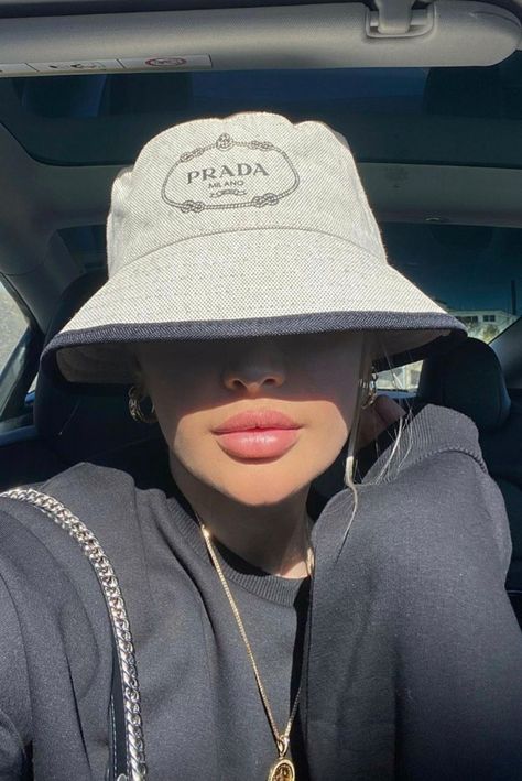 Bucket Cap Poses, Prada Bucket Hat Outfit Summer, Black Prada Hat Outfit, Chic Fitted Bucket Hat, Girl With Cap Aesthetic, Prada Bucket Hat, Prada Hat, Bucket Hat Outfit, Beautiful Ocean Pictures