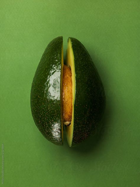 Cut avocado with shiny peel on green by Milles Studio for Stocksy United Avocado Photography, Avocado Aesthetic, Cut Avocado, Avocado Art, How To Cut Avocado, Green Avocado, Pop Art Images, Food Texture, Fruit Photography