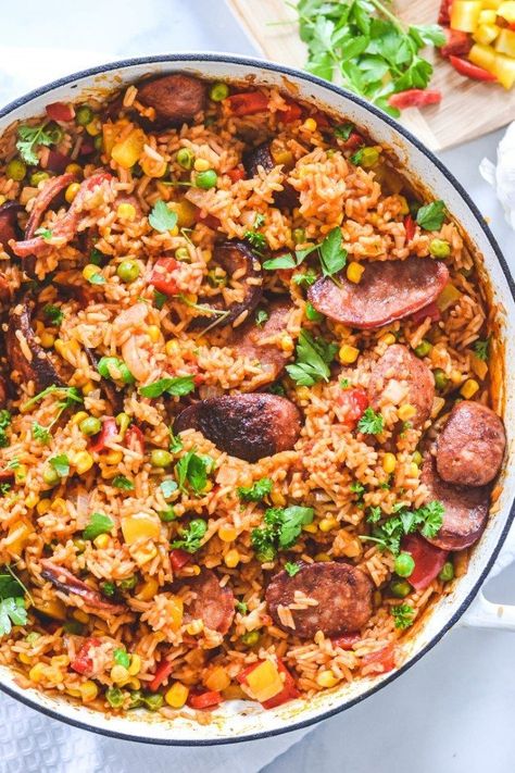 This family-friendly Spanish chorizo rice makes a healthy, filling and affordable meal that everyone will love! Made with charred chorizo sausage, capsicum and Spanish inspired spices, this hearty, flavourful dish all comes together in one pot- in less than 30 minutes! Spanish Rice With Sausage, Spanish Rice With Chorizo, Meals With Chorizo Sausage, Spanish Rice And Sausage, Pasta With Chorizo Sausage, Spanish Sausage Recipes, Chorizo Rice Recipes, Chorizo And Rice Recipes, Recipes Using Chorizo Sausage