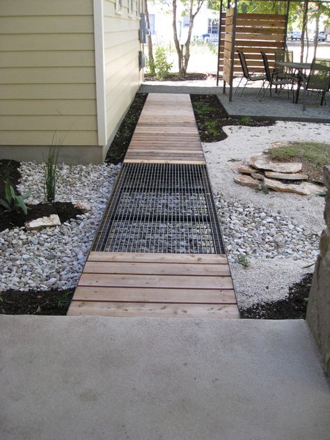 This is exactly what I'm picturing along the back of the house.  A wood deck with metal grate panels like this installed above basement window wells. Landscape Metal Grating Design, Pictures, Remodel, Decor and Ideas Wood Walkway, Wood Path, Walkway Design, Wooden Walkways, Modern Landscape Design, Rain Garden, Porch Design, Diy Garage, Wooden Garden