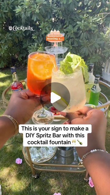 Cocktails (21+ to follow) on Instagram: "Sip, spritz, and sparkle at this DIY fountain bar! Craft your perfect spritz at your next party!Bubbles and bliss await you all summer long! What’s your favorite kind of spritz👀 Link to the cocktail fountain is in our bio!✨ @cocktails may earn commission through links in our socials  #DIY #cocktails #spritz #aperolspritz #hugospritz #prosecco #hostingera #spritzbar #summercocktails #summerdrinks #champagne #hosting" Diy Spritz Bar, Cocktail Fountain, Spritz Bar, Party Bubbles, Diy Cocktails, Diy Fountain, Aperol Spritz, Summer Cocktails, Summer Drinks