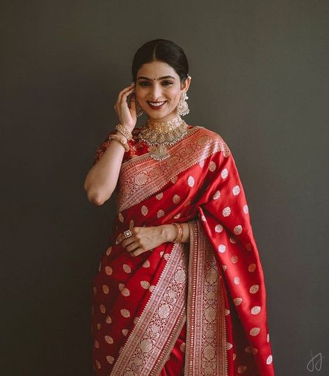 ShimmerMe | Reshma Thomas on Instagram: "Got this stunner dolled up for her engagement! Thanks @irine__thomas for choosing me to be a part of your special day! May you both be blessed with the best always💖 Saree: @sabyasachiofficial Jewellery: @jaipurgems Photography: @jacksonjamesphotography . . . #bridesofshimmerme #keralamakeupartist #bangaloremakeupartist #keralabride #southindianbride #wedmegoodsouth #wedmegoodbride #indianbride #bridesofsabyasachi #sabyasachibride #bridalsarees #bridalmak Red Shalu Saree For Bride, Red Saree Jewellery Ideas, Bridal Shalu Saree, Red Engagement Saree, Red Saree Reception Look, Red Saree Bride, Bengali Bride Saree, Red Benarasi Saree, Indian Wedding Saree Collection