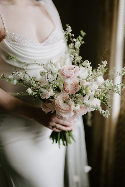 Our beautiful, elegant spring bridal bouquet created with stunning Italian ranunculus & spirea photographed  at the Angel hotel Wedding Bouquet With Ranunculus, Ranunculus Bride Bouquet, Spirea Flower Bouquet, Spirea Bouquet, Wedding Bouquet Ranunculus, Bride Bouquet Elegant, Italian Wedding Bouquet, Ranunculus Aesthetic, Ranunculus Bouquet Wedding