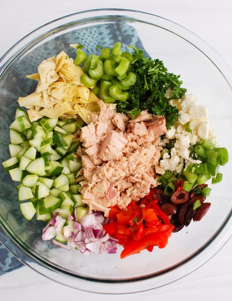 Mediterranean Tuna Salad is a healthy twist on classic tuna salad. Your favorite Mediterranean ingredients like feta cheese, olives and fresh vegetables are mixed with tuna and a Greek yogurt dill dressing. This works great for lunches on pita or over lettuce or bring it to a summer get together! // acedarspoon.com #ad #tunasalad #tuna #Mediterraneandiet #salad Couscous Salad Dressing, Tuna Salad Dressing, Yogurt Dill Dressing, Mediterranean Ingredients, Tuna Fish Salad, Mediterranean Tuna, Lebanese Salad, Mediterranean Tuna Salad, Classic Tuna Salad