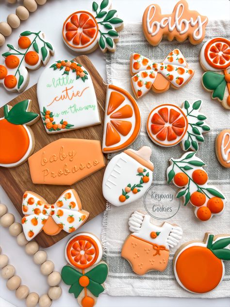 Indulge in the sweetest anticipation with these adorably decorated sugar cookies for a baby shower! These little works of art are crafted with love, featuring charming designs that capture the joy and wonder of welcoming a precious baby into the world. Little Cutie On The Way, Cutie On The Way, Cutie Is On The Way, Orange Baby Shower, Birthday Cookie, Shower Cookies, Decorated Sugar Cookies, Sugar Cookie Designs, Summer Baby Shower