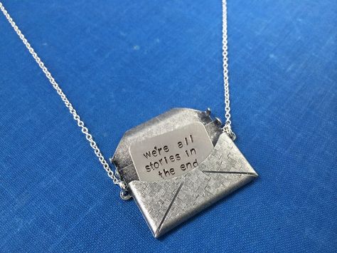 Matt Smith Karen Gillan 11th Doctor Amy Pond Doctor Who Inspired Hand Stamped Handmade Silver envelope hidden letter message necklace. It is hand stamped with the quote, "we’re all stories in the end just make it a good one". Very proud of this ORIGINAL design. I make these by hand and ship them from Maryland, USA. Check out my other DW jewelry and crafts on my Pinterest page! Dr Who Jewelry, Nerd Jewelry, Hidden Letters, Latest Sunglasses, Message Necklace, Amy Pond, 11th Doctor, Karen Gillan, Take My Money