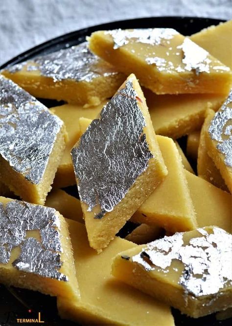 Make this Easy Badam Burfi with Almond flour under 30 mins. This Almond Burfi is a quick fix for your sweet cravings and also can be a healthy alternative to candies for kids, they love these Badam katlis as as adults. #badamburfiwithalmondflour #easybadamburfi #almondburfi #almondkatli #badamkatli #badambarfi #almondburfiwithalmondflour #foodiesterminal Kaju Barfi, Barfi Recipe, Burfi Recipe, Spicy Snacks Recipes, Vegetarian Fast Food, Tastemade Recipes, Indian Cooking Recipes, Sweet Dishes Recipes, Vegetarian Snacks Recipes