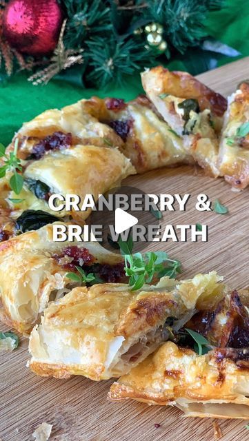 Vanya Insull on Instagram: "Cranberry & Camembert Pastry Wreath 💫

You may have to make 2 because it will be so popular. 🤩

Ingredients:
• 1 sheet puff pastry (thawed)
• 125g camembert (sliced)
• 100g cranberry sauce
• Handful of basil
• 1 egg (whisked)

Method:
1. Preheat oven to 180°C fanbake.
2. Place a large piece of baking paper on the bench then place your sheet of puff pastry on top.
3. Take a small bowl and press it down in the centre of the pastry to make a mark.
4. Remove the bowl, then in the centre of the circle, make 4 cuts as if cutting a pizza into 8 pieces.
5. In a wreath shape, around this circle, spread the cranberry sauce. Layer up the sliced camembert and basil on top of the sauce.
6. Take one piece of pastry from the centre, over the top of the filling and connect in Baked Camembert With Puff Pastry, Cranberry Camembert Puff Pastry, Cranberry Camembert, Puff Pastry Wreath, Pastry Wreath, Filo Pastry Recipes, Filo Pastry, Mark 4, Egg Whisk