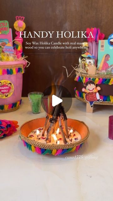 Casah 1775 | Luxury Gifting on Instagram: "Keeping traditions alive, Casa 1775 is here with yet another unique gifting experience! 🌈  Introducing our Handy Holika Candles made with soy wax and real mango wood, will make sure you can celebrate Holi from any part of the world! 💕  Reach out to us for all your gifting needs! 🥂  📲 Casa 1775 📞 +7066607864 💌 casa1775official@gmail.com . . . . . . . . [ Holi, colourful, hampers, gifts, festival of colours, india, budget friendly gifts, holi party, nagpur, Indian culture, gulaal, thandai, rang, unique, ideas, diy]" Holi Party Ideas, Unique Candle Making Ideas, Holi Theme, Festival Of Colours, Holi Gift, Holi Party, Indian Gifts, Budget Friendly Gift, Color Festival