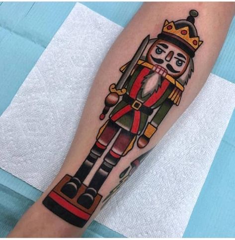 39 Christmas Tattoos You are Definitely Going To Love - The XO Factor Nutcracker Tattoo, Ballet Tattoos, Xo Tattoo, Christmas Tattoos, Soldier Tattoo, Traditional Tattoo Inspiration, Christmas Tattoo, C Tattoo, Old School Tattoo Designs