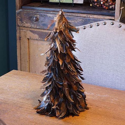 Small Natural Schlappen Feather Tree 18" This decorative Feather Tree is made with Natural Schlappen Feathers and stands 18"" tall and approx 6-8 inches in diameter at the base. Feather Christmas Trees make great home, office or special event decorations. They also look great for Holiday window displays Masculine Christmas Tree, Crow Costume, Holiday Window Display, Raven Wings, Topiary Tree, Feather Mask, Yellow Feathers, Special Events Decor, Purple Feather