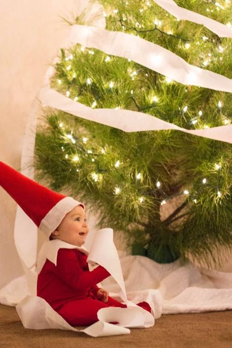 Image Elf On The Shelf Baby, Baby Christmas Photography, Funny Christmas Photos, Christmas Baby Pictures, Baby Elf, Baby Christmas Photos, Milestone Photos, Elf On A Shelf, Milestone Pictures