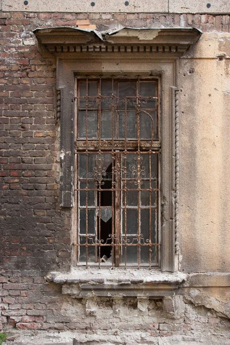 Old historic window with broken glass and steel bars royalty free stock images Historic Windows, Michael Banks, Broken Windows, Old Warehouse, Bar Stock, Broken Window, Yellow Wall, Old Room, Yellow Walls