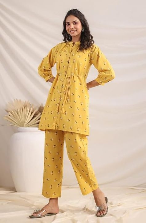 Embrace vibrant elegance with the Janasya Women's mustard cotton cambric co-ord set. Crafted from pure and breathable cotton, this set features a bright geometric print top in gathered style and band collar, and cuff s;leevs that create a playful and feminine look adding a button placket and drawstring tie-up on waist, the fit add a touch of modernity, making it a perfect choice for casual occasions Bandhani Pattern, Cord Set, Stylish Top, Band Collar, Co Ord Set, Feminine Look, Outfit Set, Two Piece Dress, Modern Fashion